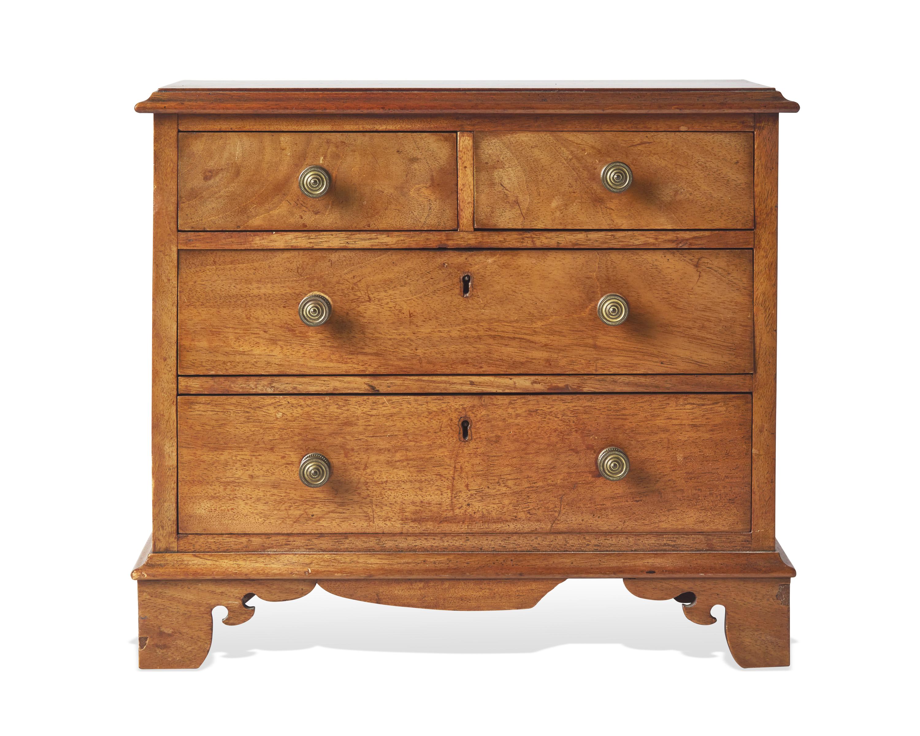 A Miniature George III or Regency Mahogany Chest of Drawers