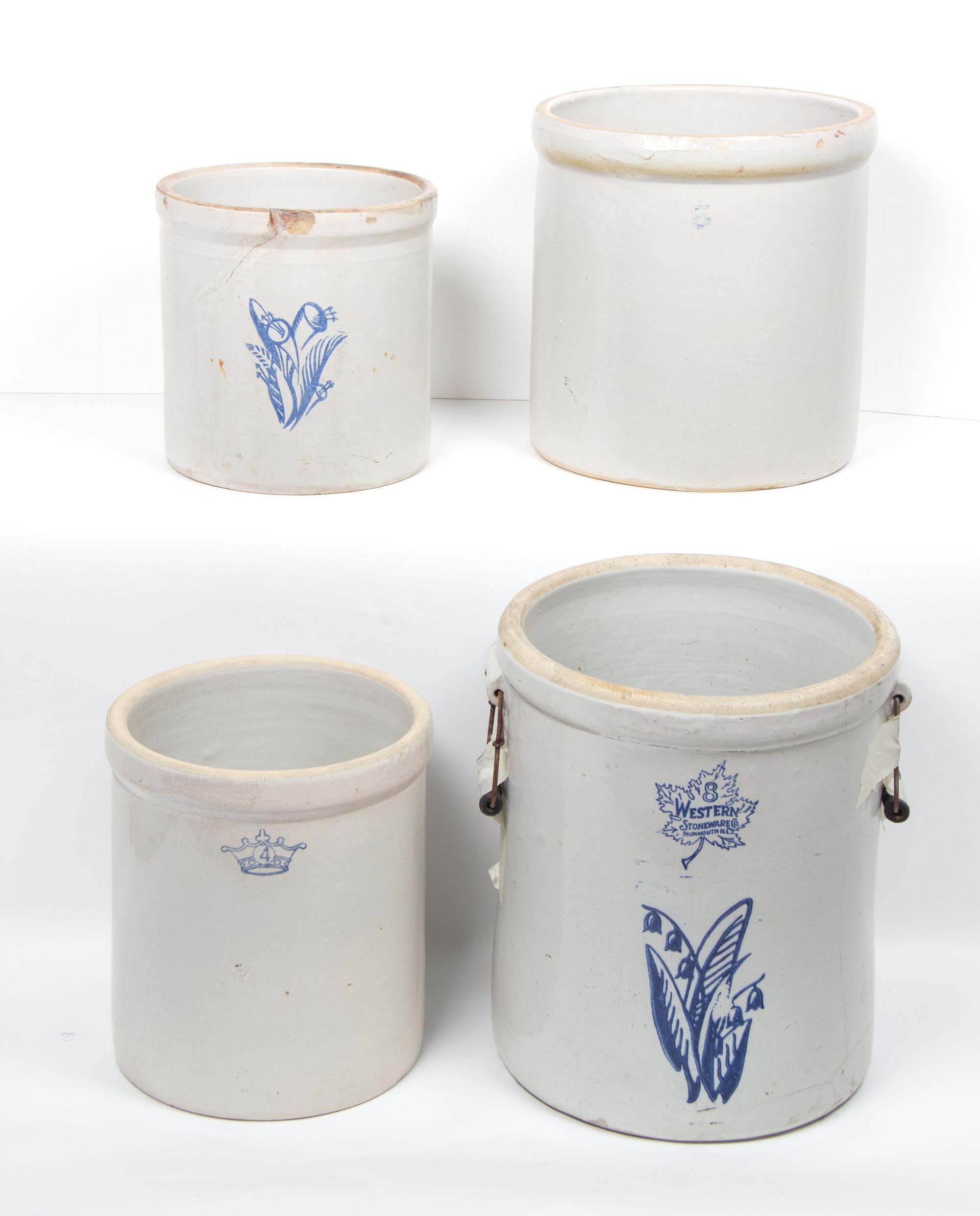 A Collection of Four Oversized Stoneware Pots Height of tallest 16 1/2 inches.