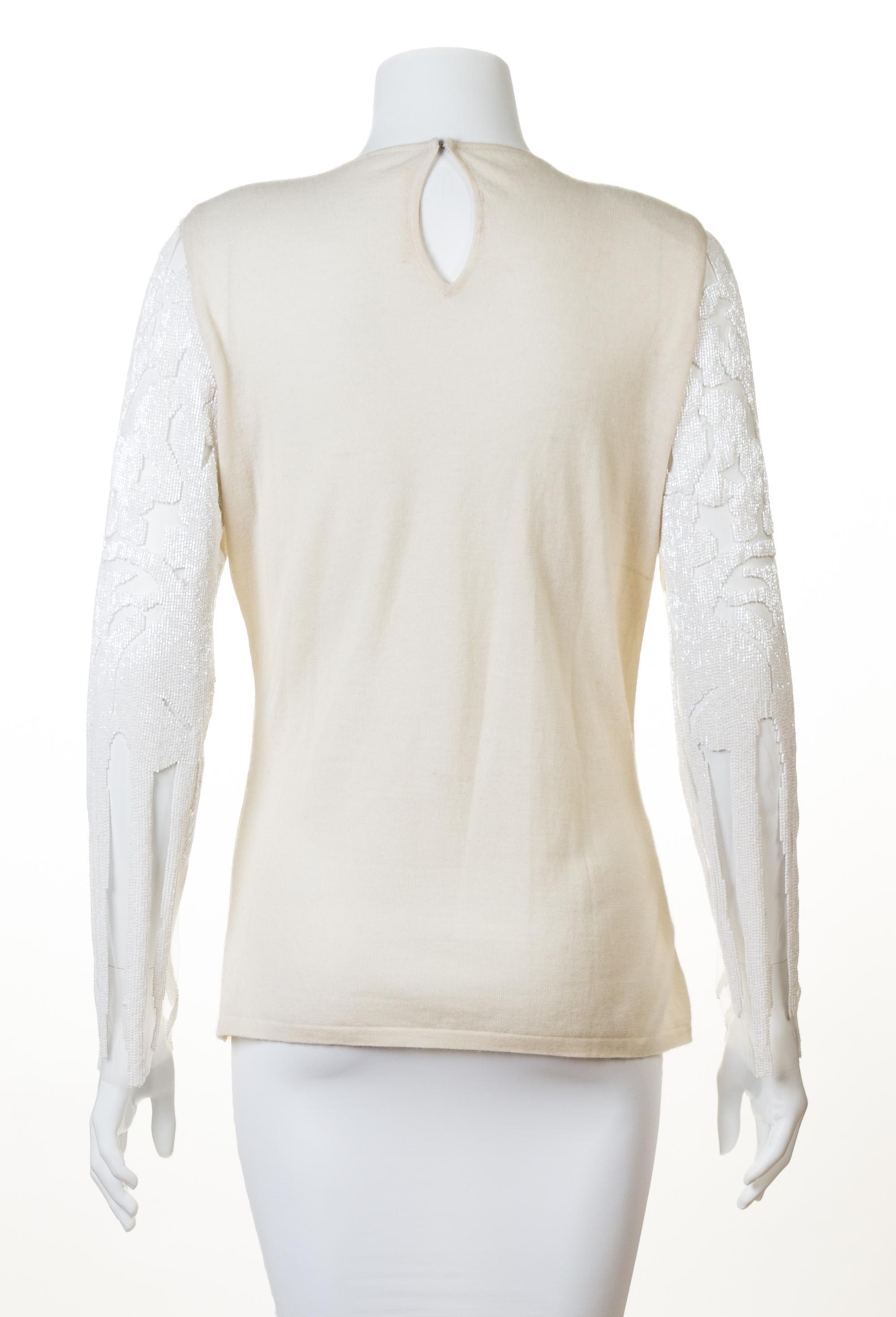 A Naeem Khan Cream Cashmere Beaded Sweater, Size medium.