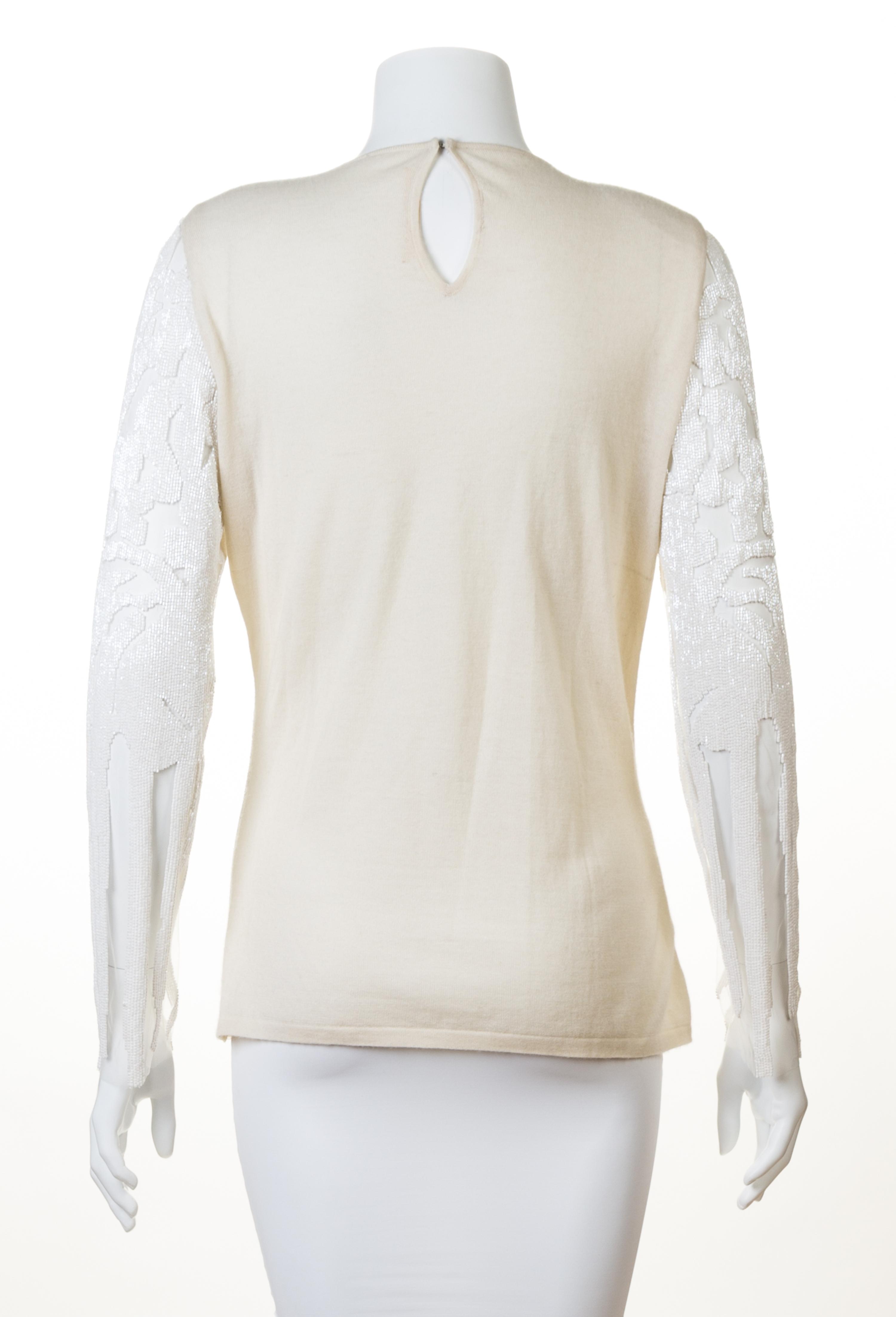 A Naeem Khan Cream Cashmere Beaded Sweater, Size medium.
