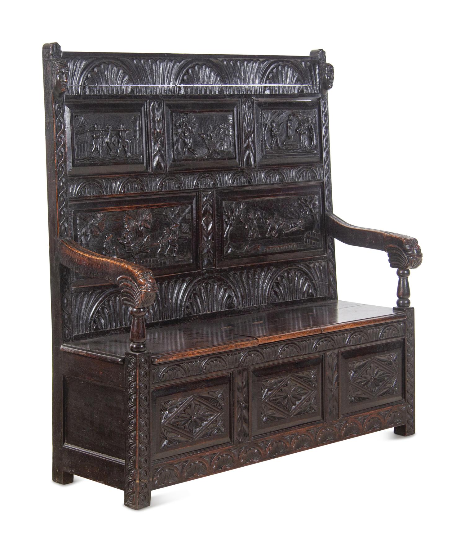 A William and Mary Style Carved Oak Settle