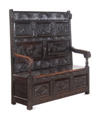 A William and Mary Style Carved Oak Settle