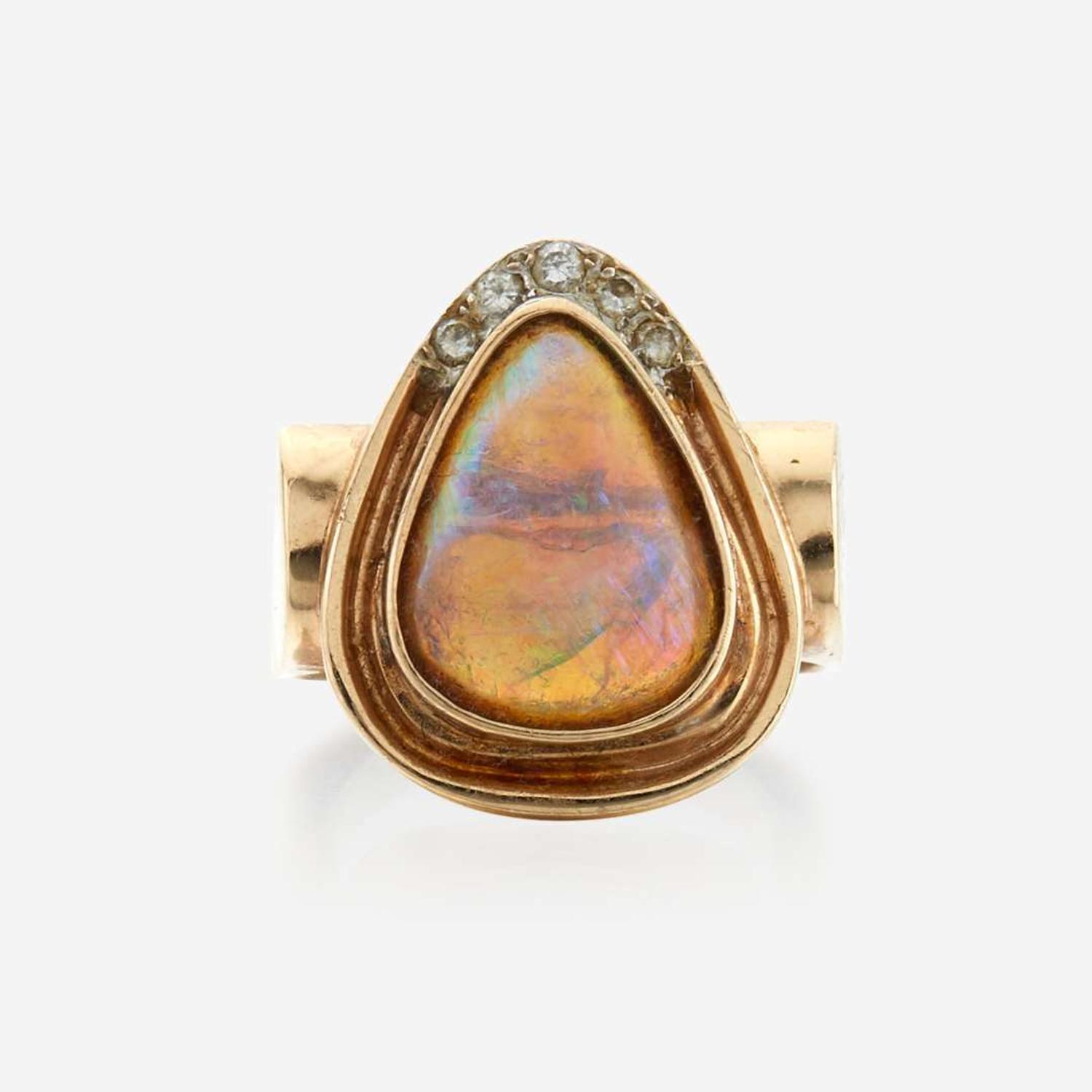 An opal, diamond, and gold ring