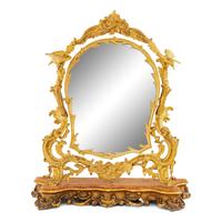 A Rococo Revival Gilt Bronze and Giltwood Dressing Mirror