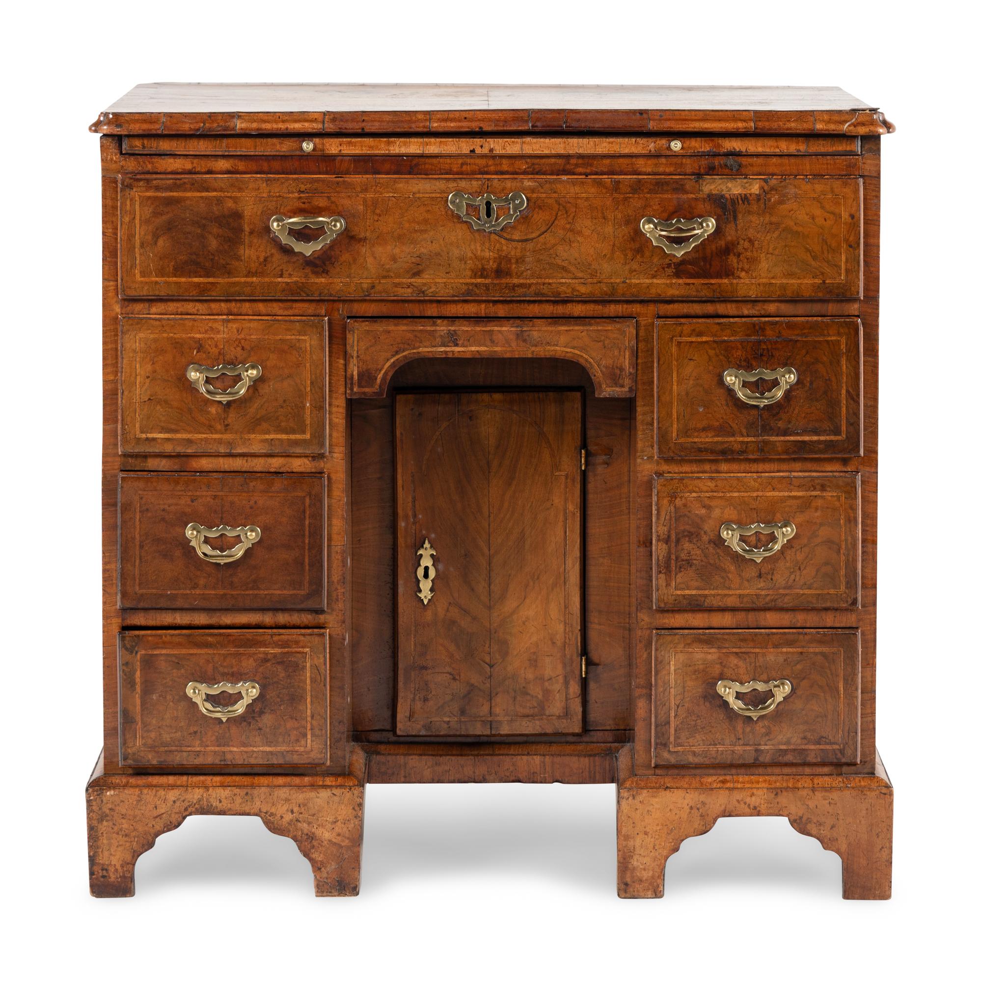 A George II Burl Walnut Kneehole Desk