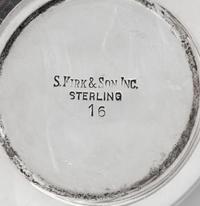 A Collection of Four S. Kirk and Son Silver Table Articles