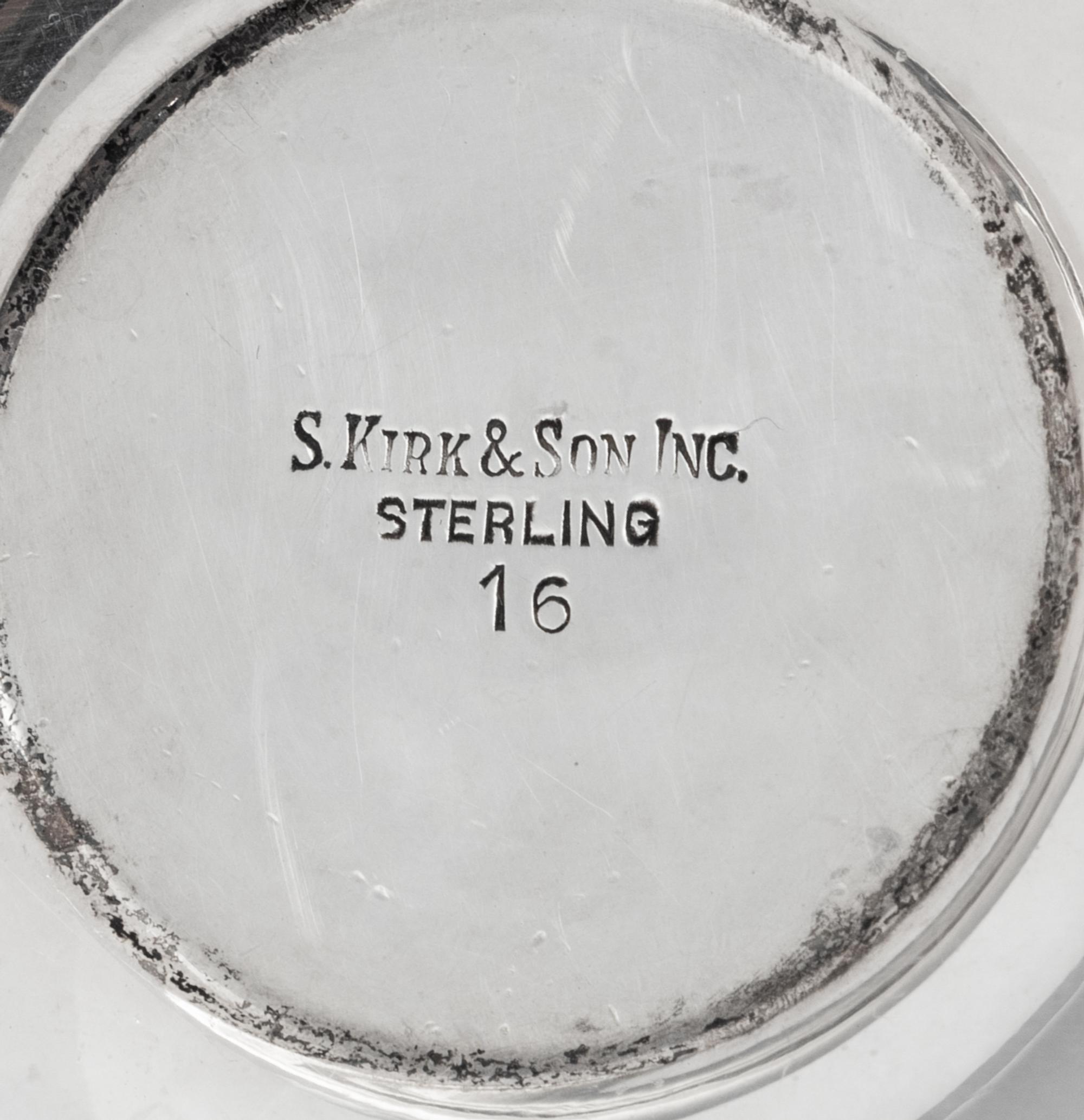A Collection of Four S. Kirk and Son Silver Table Articles