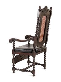 A Renaissance Revival Walnut Open Armchair