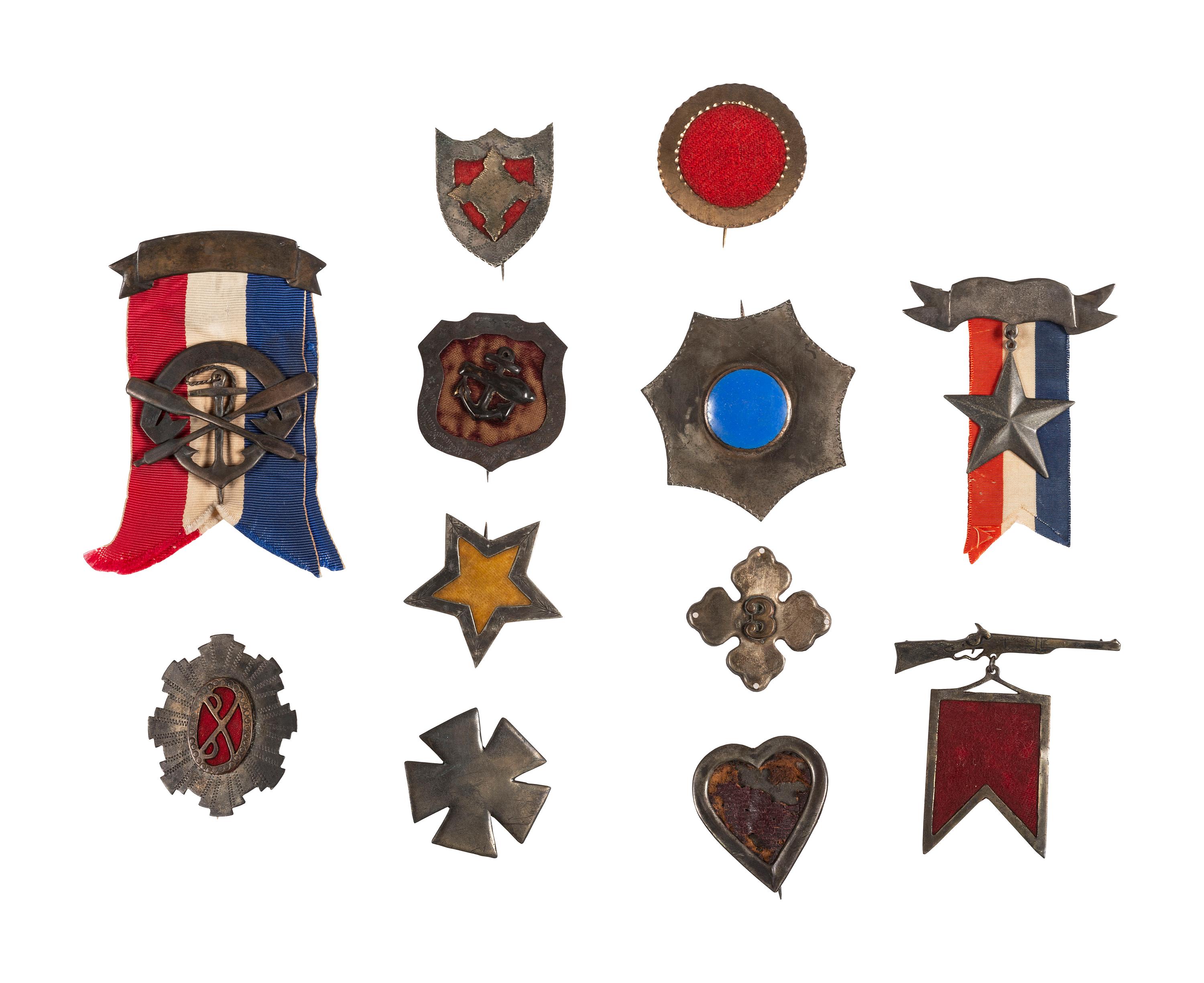 A group of 12 reproduction/fantasy corps badges collected for educational purposes, including:
