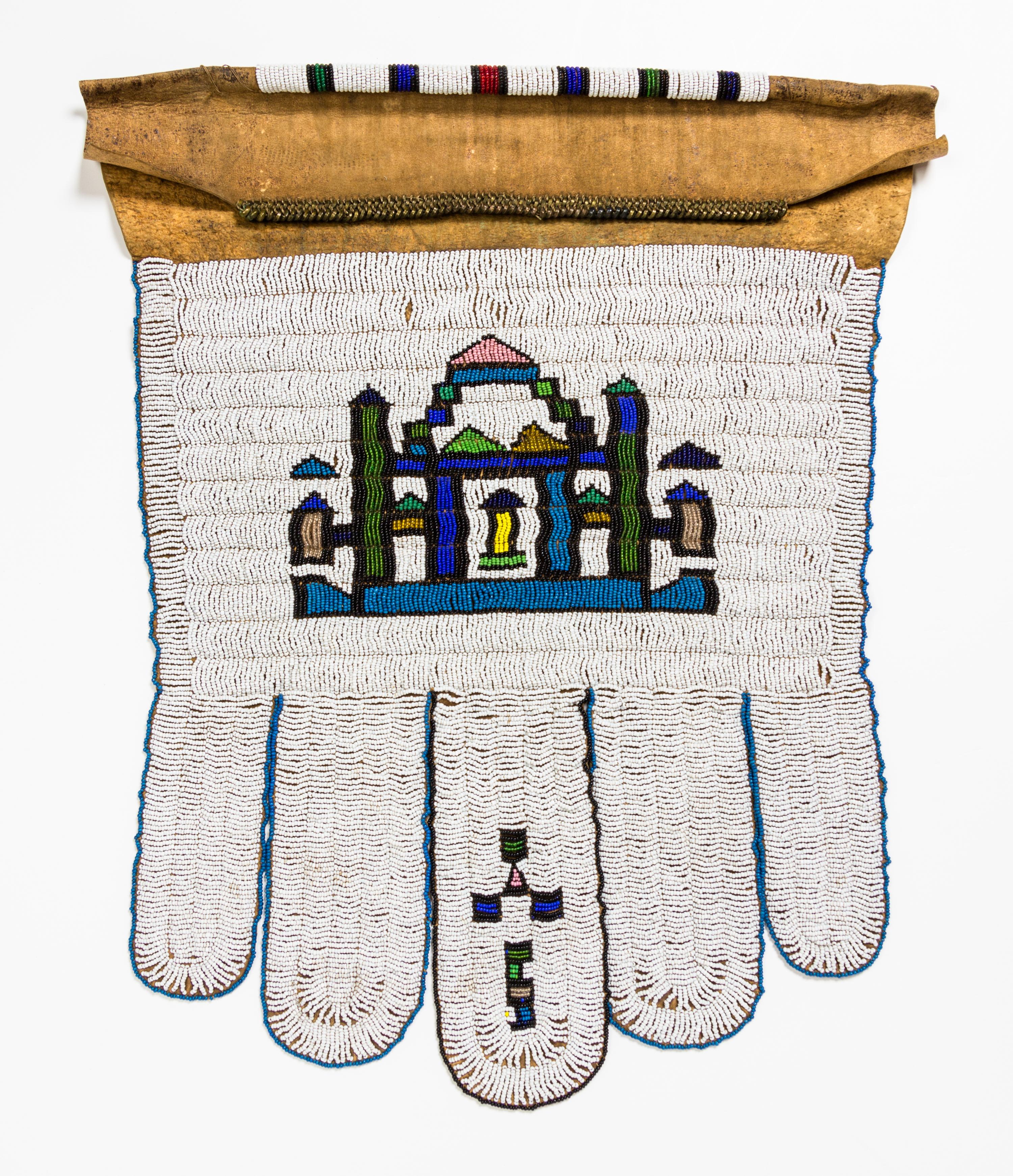 A Group of Four African Beaded Aprons Height of largest 21 1/2 x width 20 1/4 inches.