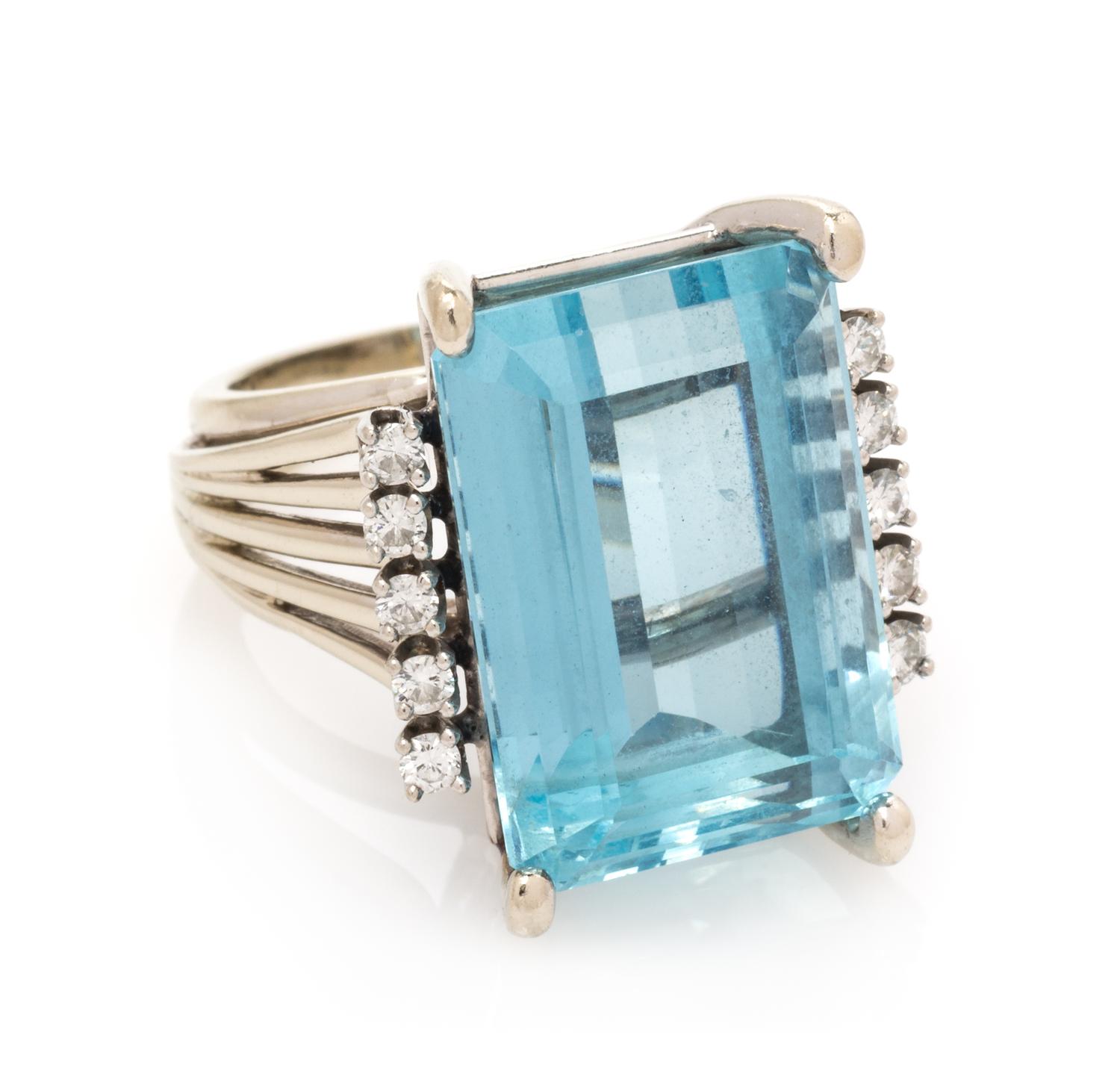 A 14 Karat White Gold, Aquamarine and Diamond Ring, 8.00 dwts.