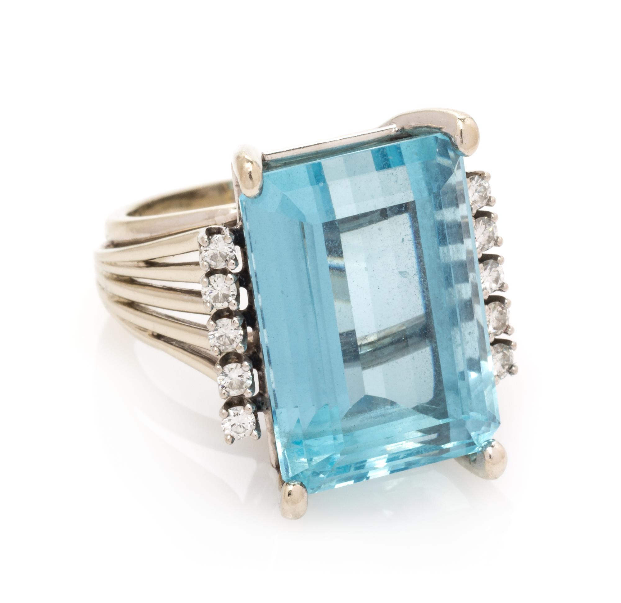 A 14 Karat White Gold, Aquamarine and Diamond Ring, 8.00 dwts.
