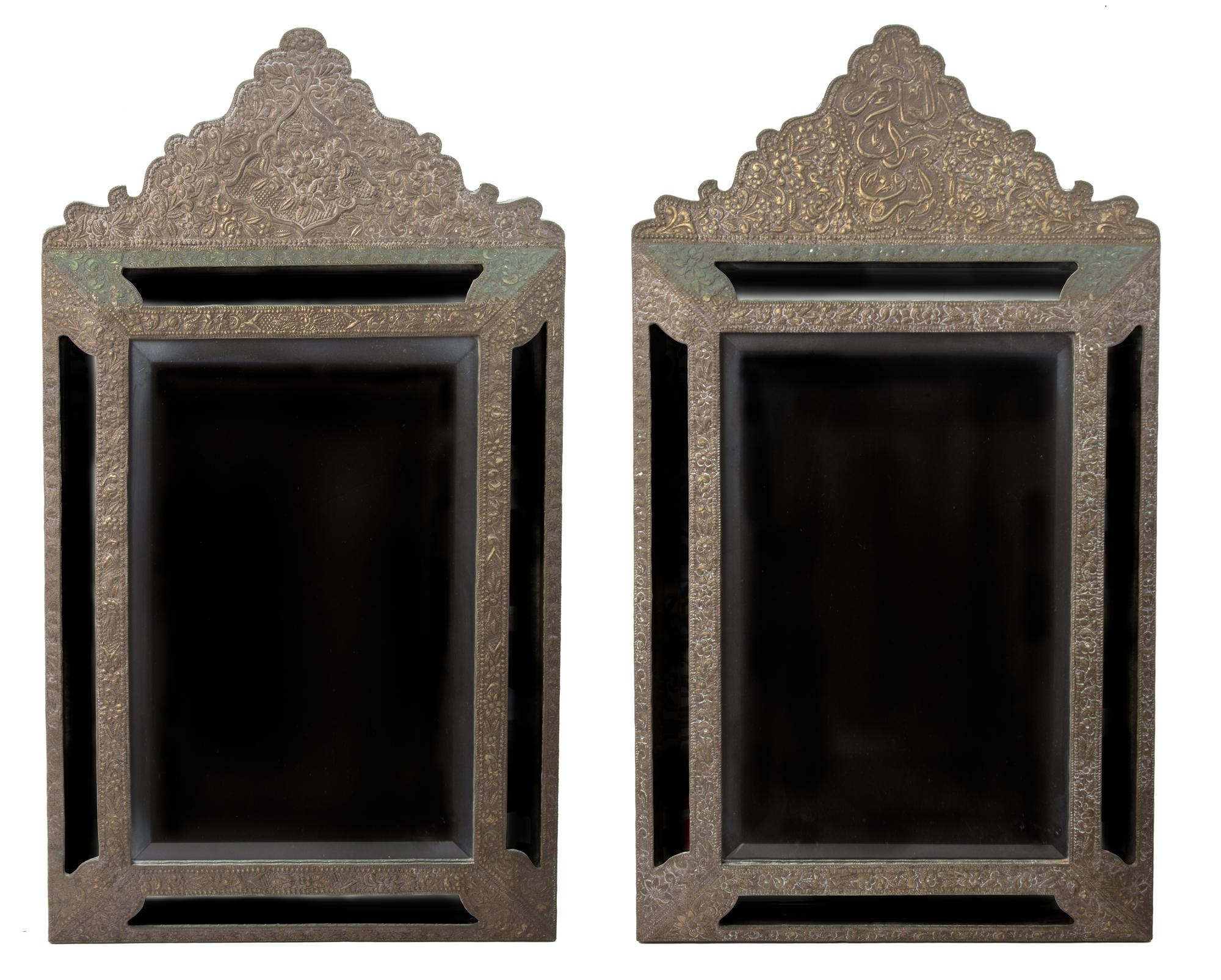 A Pair of Dutch Baroque Style Embossed Metal Mirrors Height 36 1/4 x width 20 1/2 inches. — 19TH CENTURY