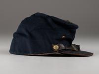 [CIVIL WAR]. Company C, 179th Pennsylvania 1858 forage cap, with identification to J.K. Hunsleker carved into visor.