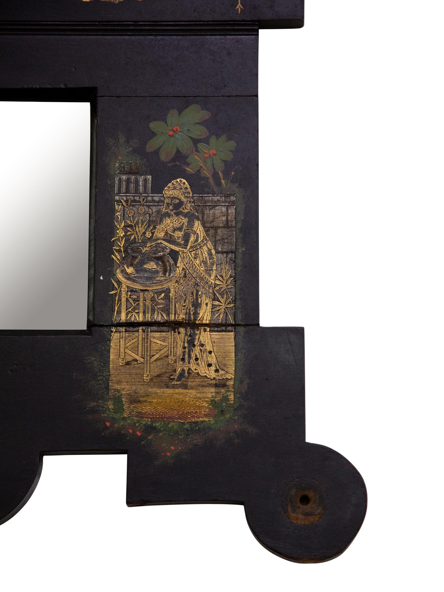 An Aesthetic Movement Gilt Decorated Ebonized Wall Mirror