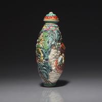 A Chinese Molded and Enameled Porcelain Snuff Bottle, Jiaqing Mark and Probably of the Period 嘉慶款 粉彩凸雕赤壁賦鼻烟壺