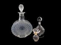 A Lalique Molded and Frosted Glass Decanter and Two Perfume Bottles — 20TH CENTURY