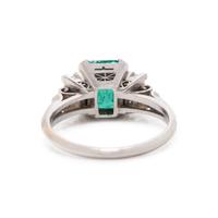 PLATINUM, EMERALD, AND DIAMOND RING