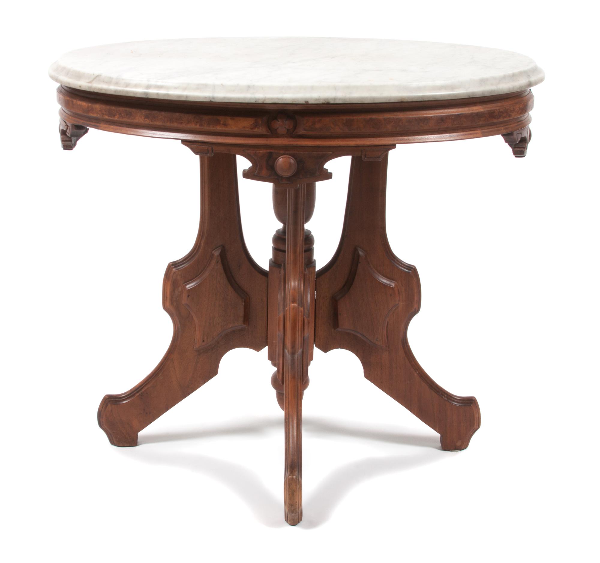 A Victorian Walnut Parlor Table Height 24 1/2 x width 28 1/2 x depth 21 inches. — 19TH CENTURY