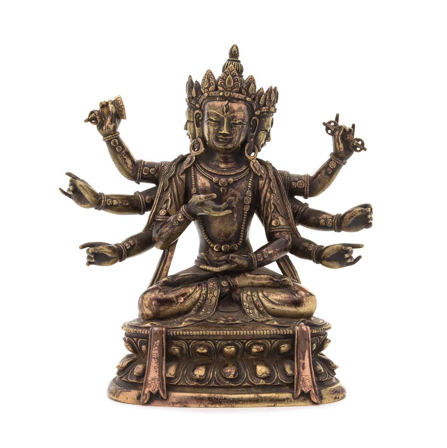 A Sino-Tibetan Gilt Bronze Figure of a Deity Height 7 inches.
