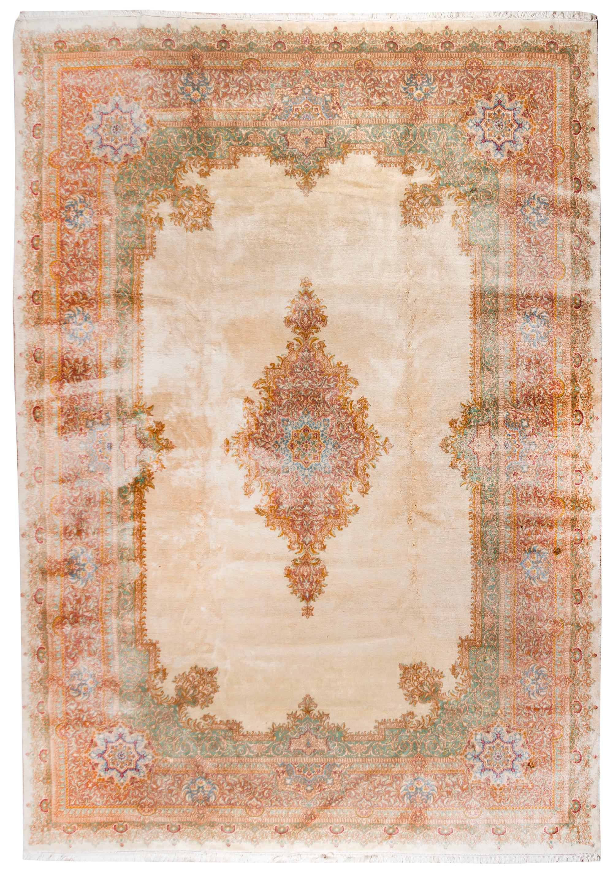 A Kirman Wool Rug 14 feet 10 inches x 10 feet 9 inches. — 20TH CENTURY