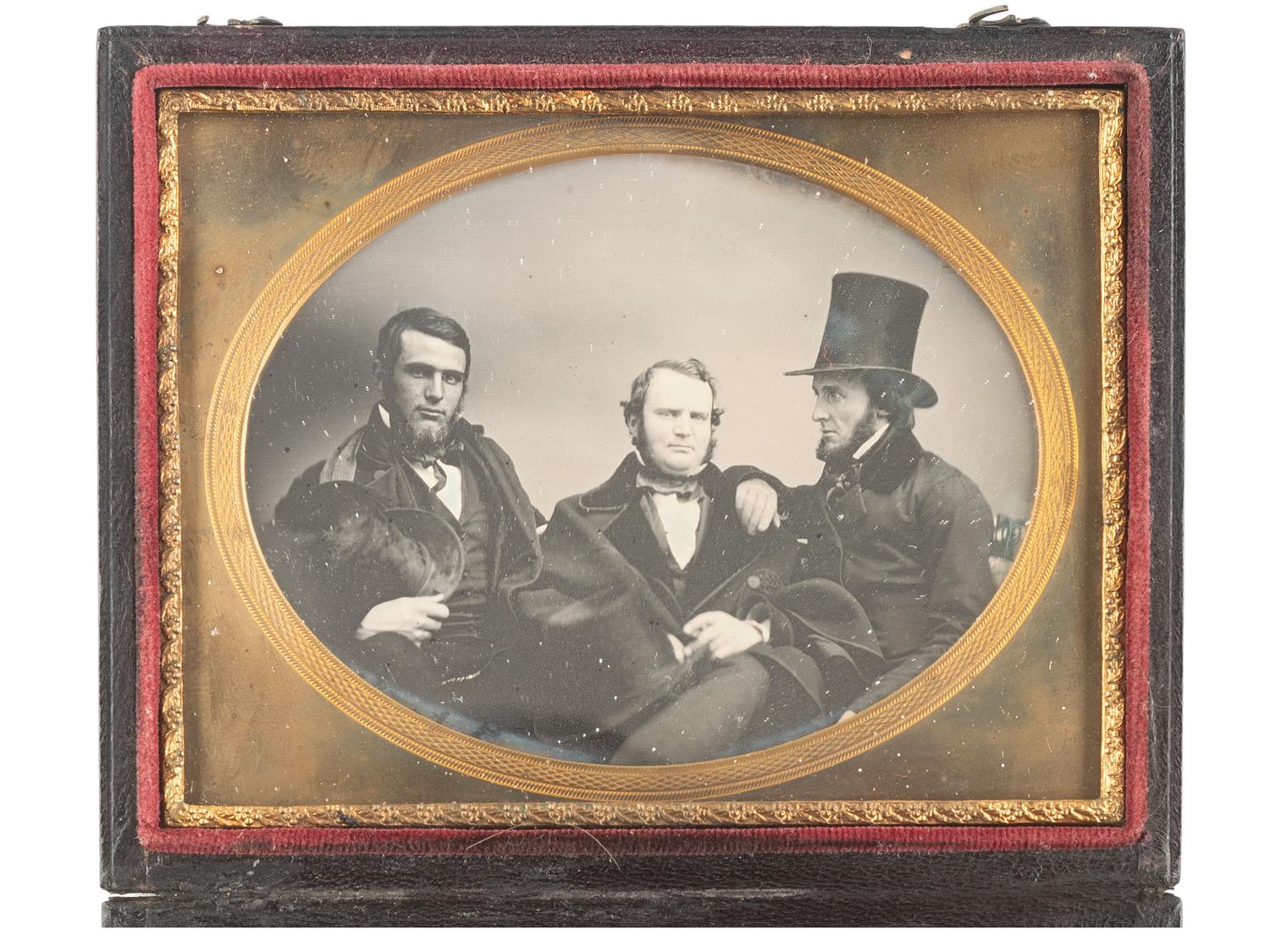 [EARLY PHOTOGRAPHY]. Three daguerreotypes of pairs and trios, incl. a group of distinguished men.