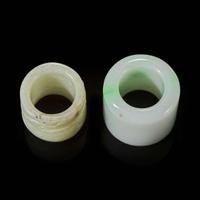 Two Chinese jade and jadeite thumb rings and a carved jade belt plaque 扳指及玉牌饰一组三件 Ming to Qing dynasty ???
