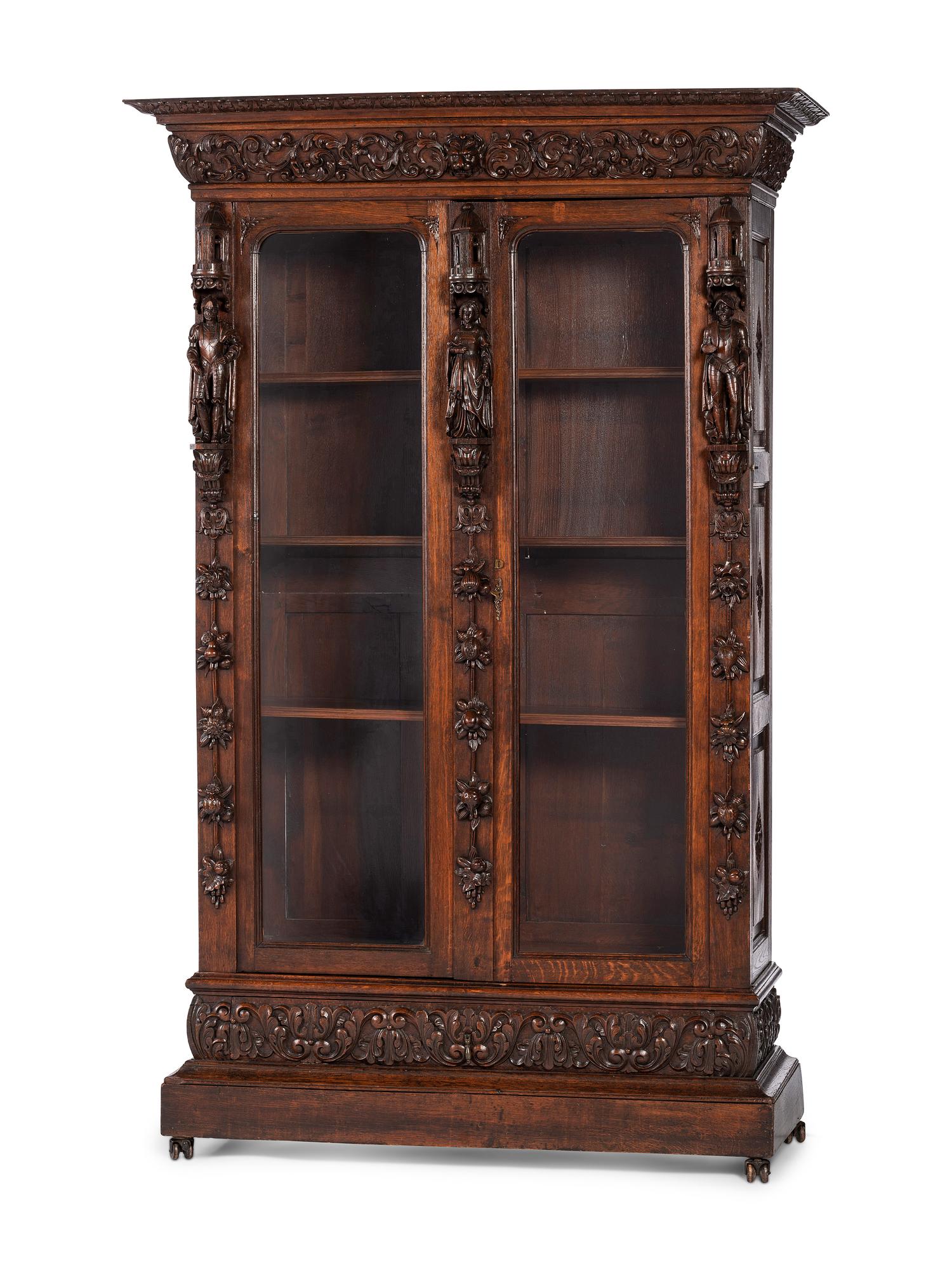 A Renaissance Revival Carved Oak Display Cabinet