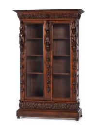 A Renaissance Revival Carved Oak Display Cabinet