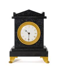 A Regency Black Slate and Gilt Bronze Mantel Clock
