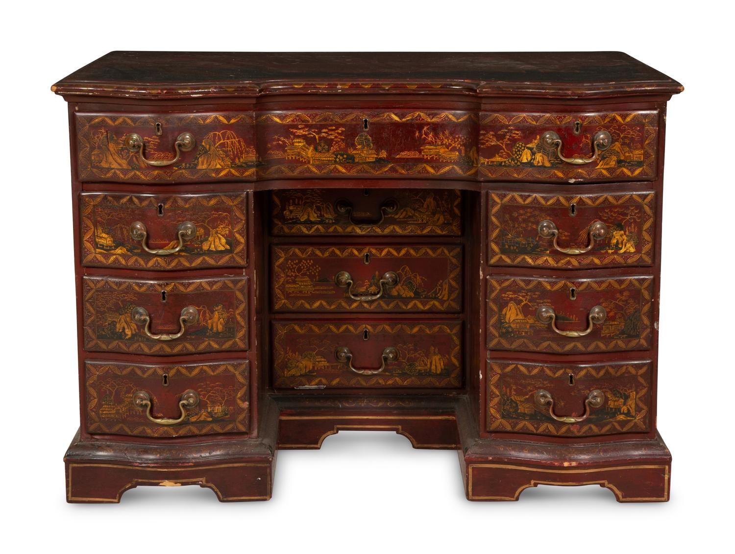 A George III Style Red and Gilt Japanned Knee-Hole Desk