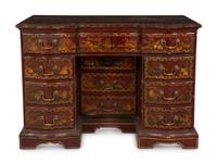 A George III Style Red and Gilt Japanned Knee-Hole Desk