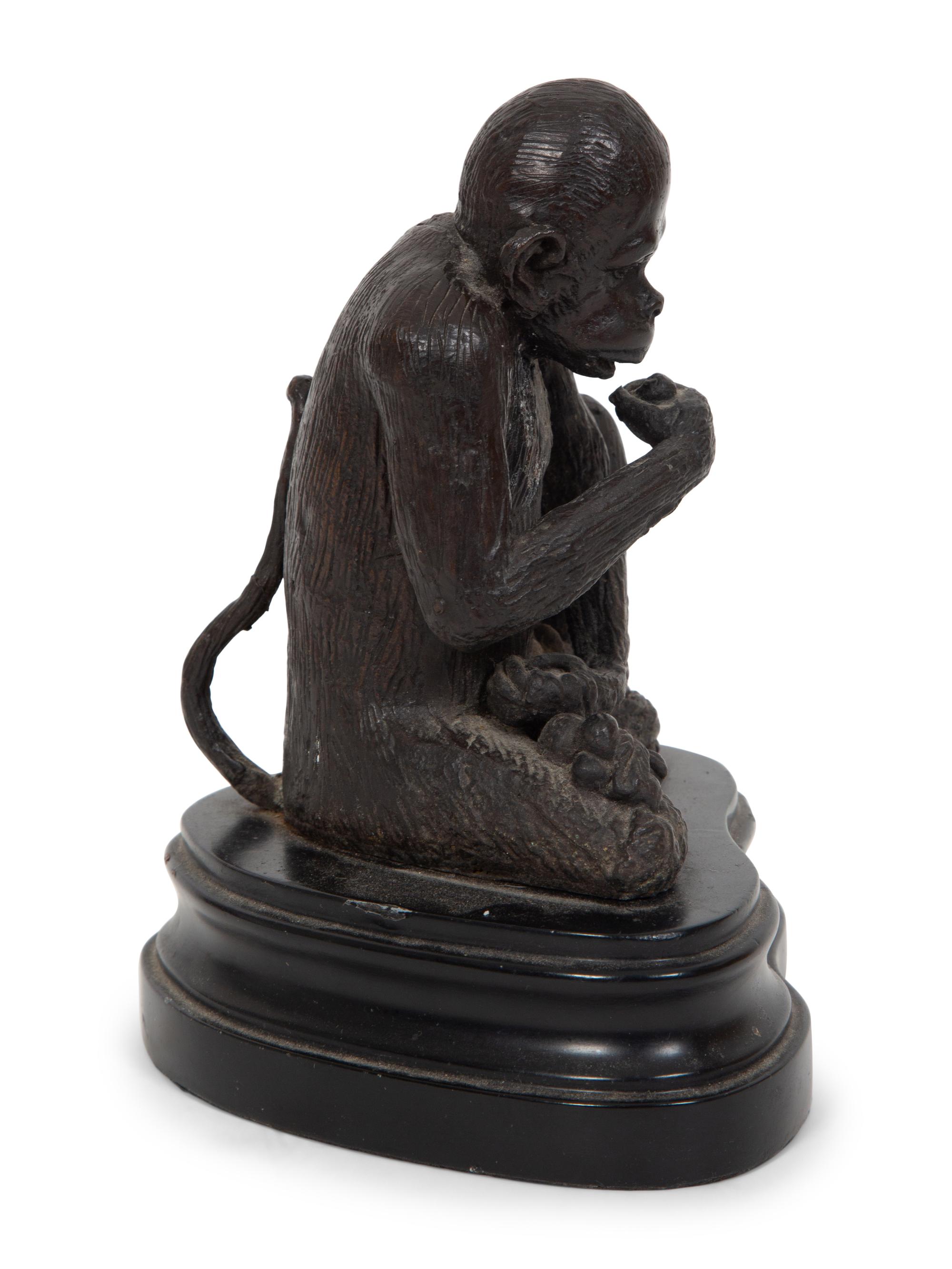 A Continental Bronze Sculpture of a Seated Monkey