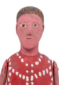 A Red Painted Wooden Figure