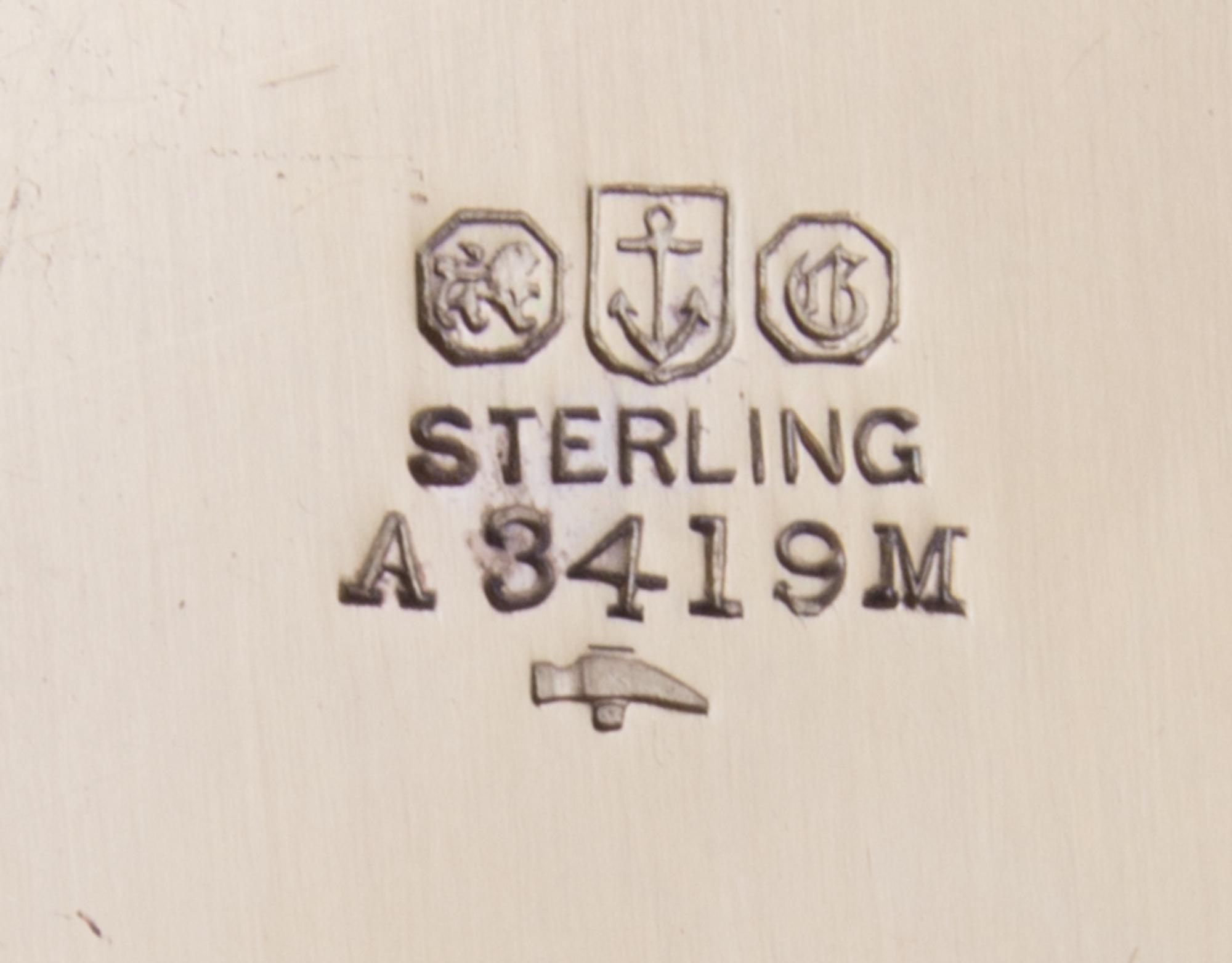 An American Silver-Gilt Ice Cream Service, Gorham Mfg. Co., Providence, RI, retailed by Spaulding, the handles decorated with floral an