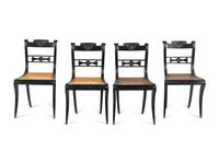 A Set of Four Regency Shell Carved Ebony Side Chairs