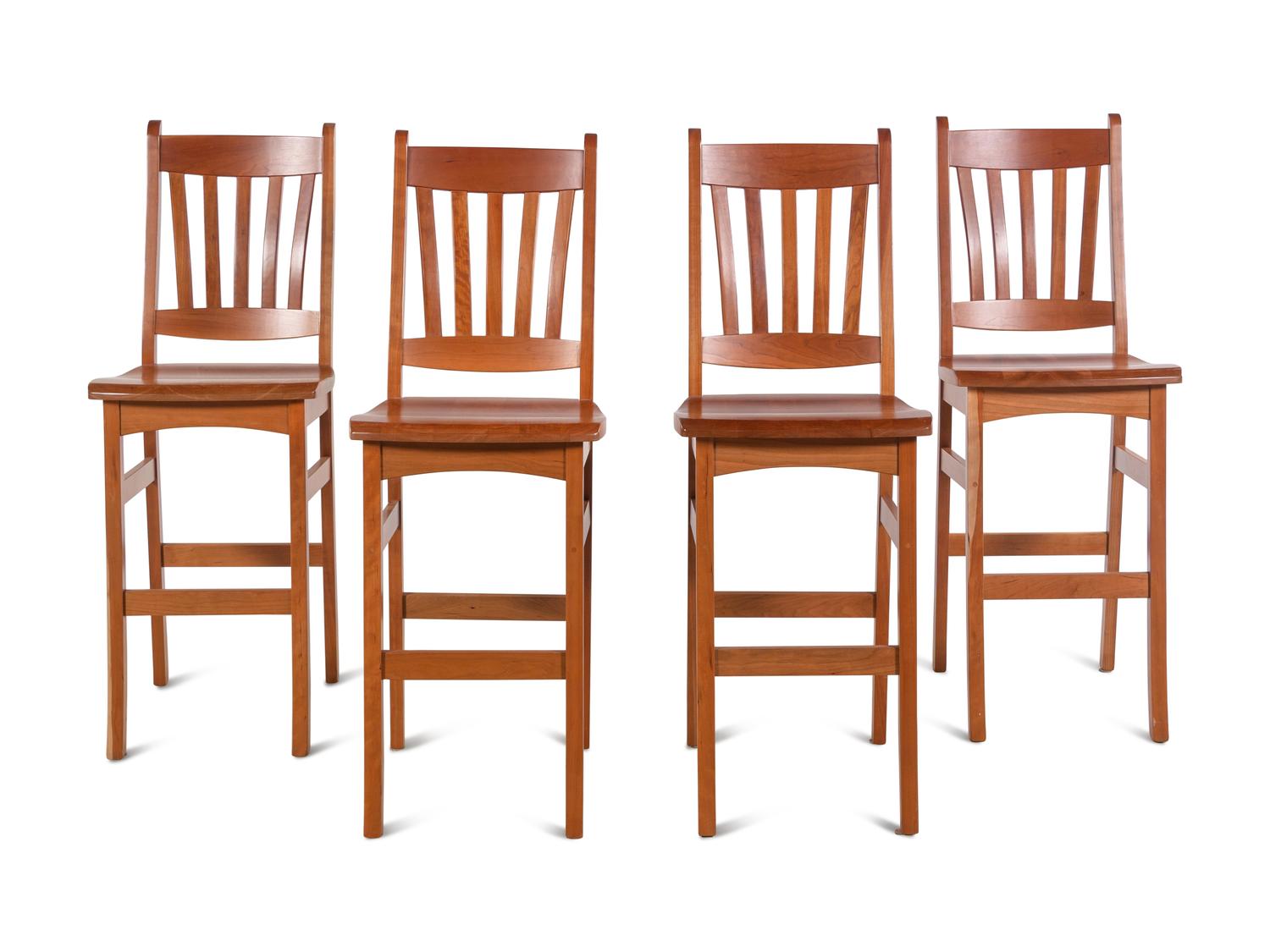 A Set of Four Arts and Crafts Style Bar Seats