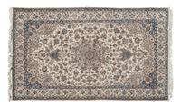 A Nain Wool Rug 9 feet 10 inches x 5 feet 11 inches. — 20TH CENTURY