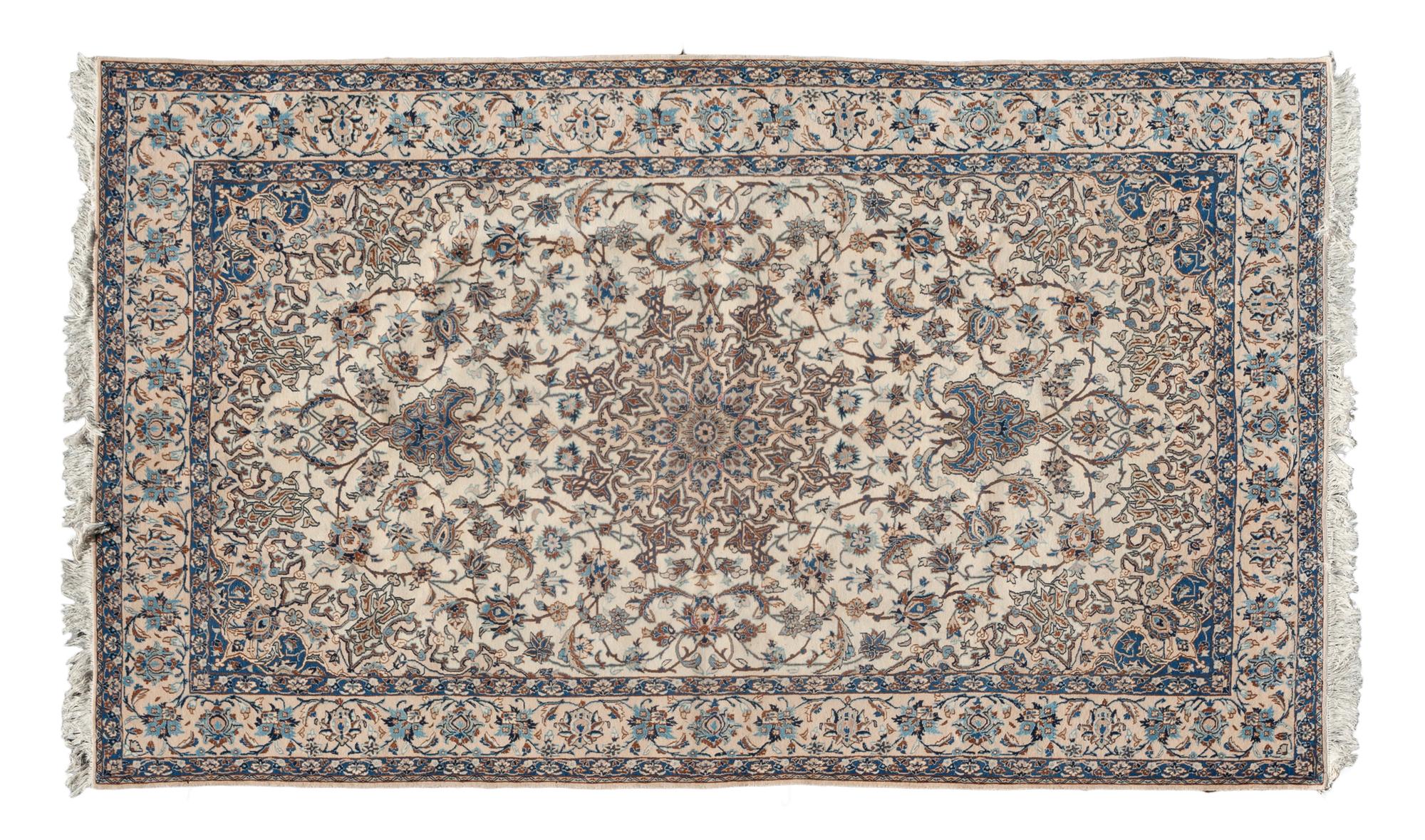 A Nain Wool Rug 9 feet 10 inches x 5 feet 11 inches. — 20TH CENTURY