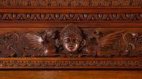 An Italian Renaissance Style Carved Walnut Cabinet