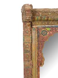 An Indonesian Carved and Polychrome Decorated Architectural Fragment Mounted As a Mirror