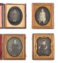 [EARLY PHOTOGRAPHY]. 30 daguerreotypes of children in sixth plate cases.