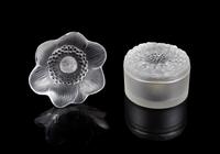 Lalique, a pair of molded and frosted glass Anemone figural articles, comprising a paper weight and a box