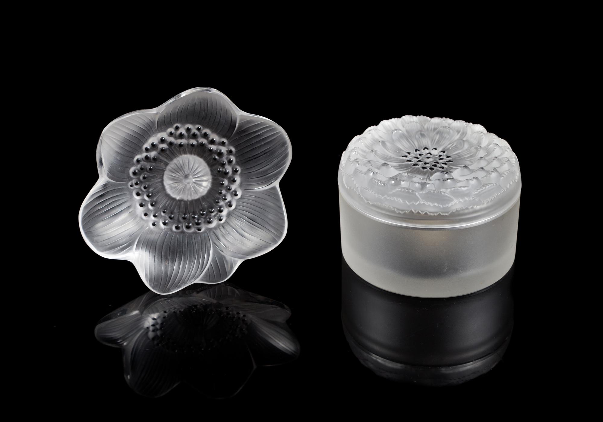 Lalique, a pair of molded and frosted glass Anemone figural articles, comprising a paper weight and a box