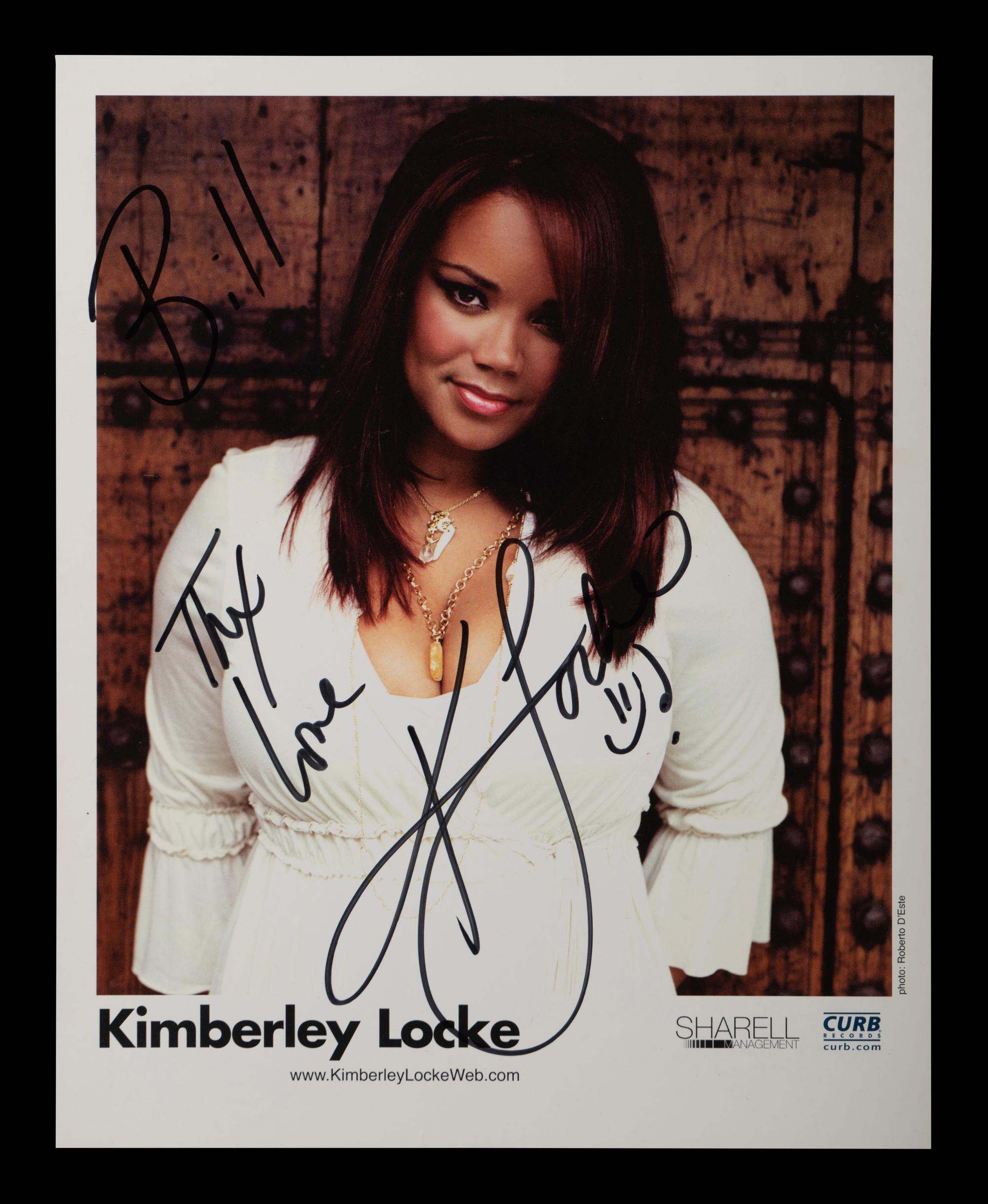 (Celebrity) A group of 10 autographed photos of musical stars, comprising: