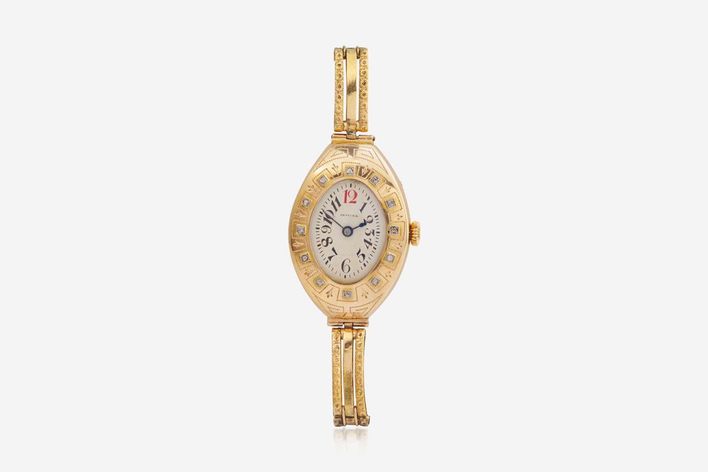 A Ladies 14K Yellow Gold Russian Invicta Watch with Diamonds