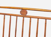 A Windsor rod-back settee, early 19th century