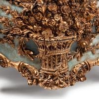 An Italian Carved, Painted and Parcel Gilt Commode
