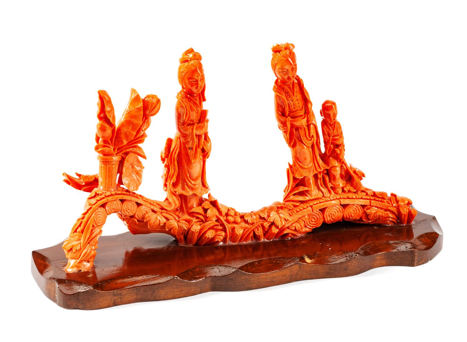 A Chinese Carved Coral Figural Group