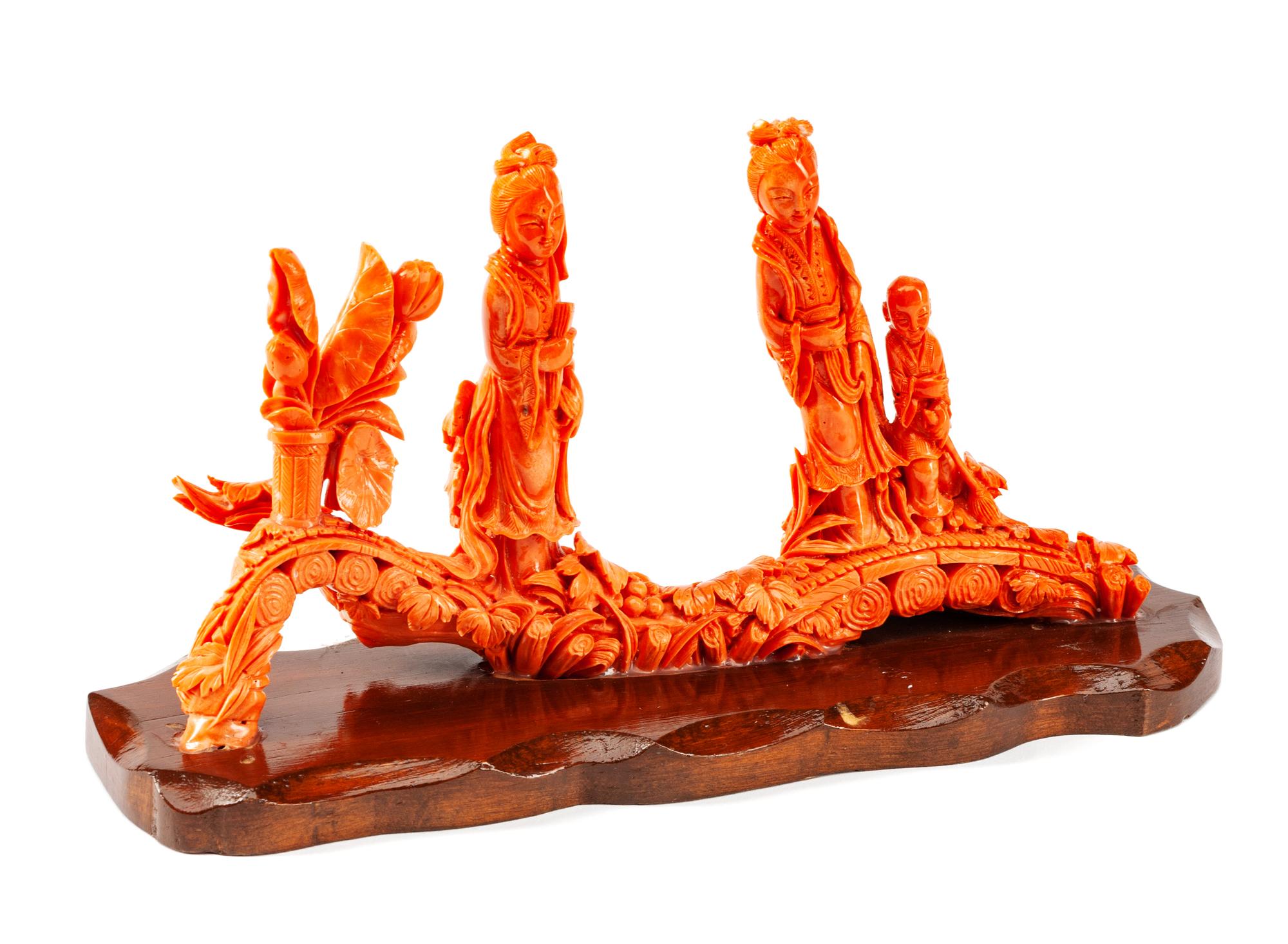 A Chinese Carved Coral Figural Group